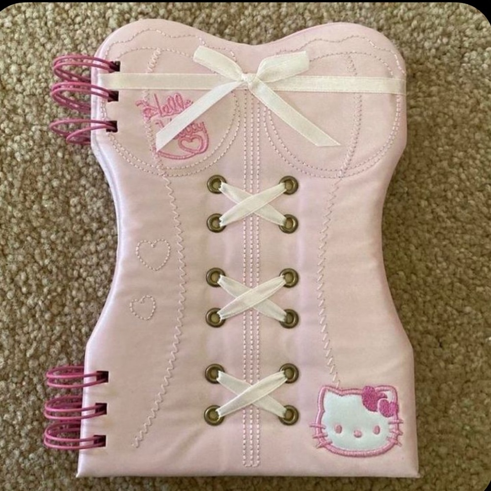 ISO hello kitty corset notebook blue or pink